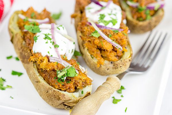 Forget the sandwich! These BBQ Pulled Pork Potato Skins are a tasty way to serve up pulled pork!