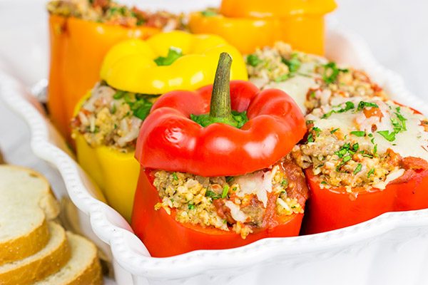 Stuffed with quinoa, brown rice and Italian sausage, these Italian Stuffed Peppers are a tasty and filling winter meal!