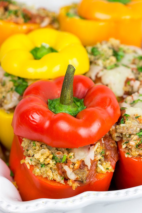 Stuffed with quinoa, brown rice and Italian sausage, these Italian Stuffed Peppers are a tasty and filling winter meal!