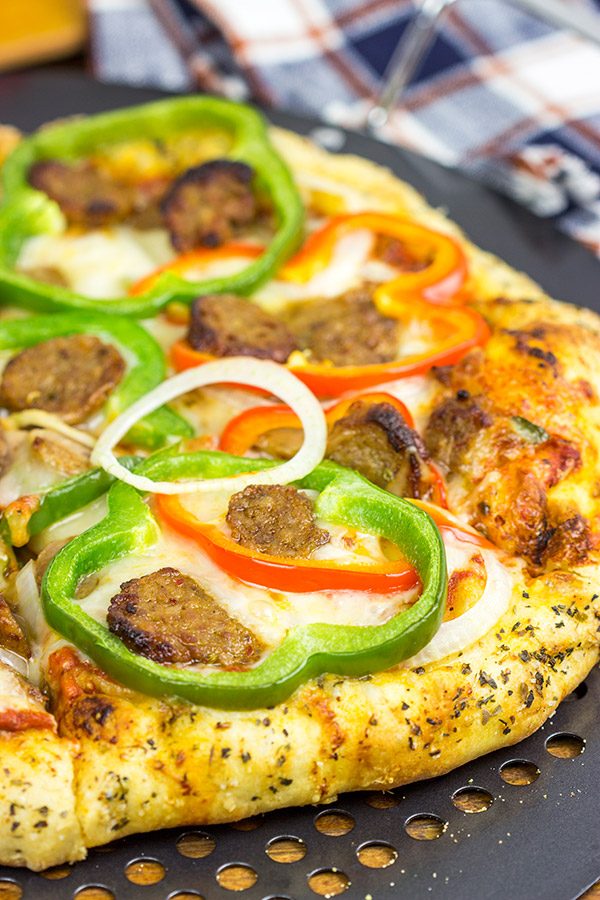 Make pizza night delicious with this Sausage and Peppers Pizza!