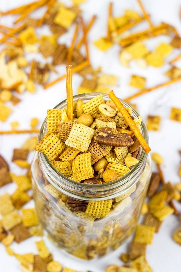 Craving a good snack for this weekend? This Slow Cooker Cajun Snack Mix is an easy and tasty treat!