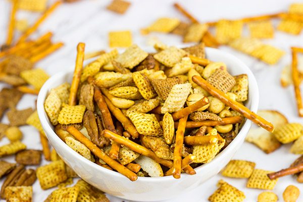 Craving a good snack for this weekend? This Slow Cooker Cajun Snack Mix is an easy and tasty treat!