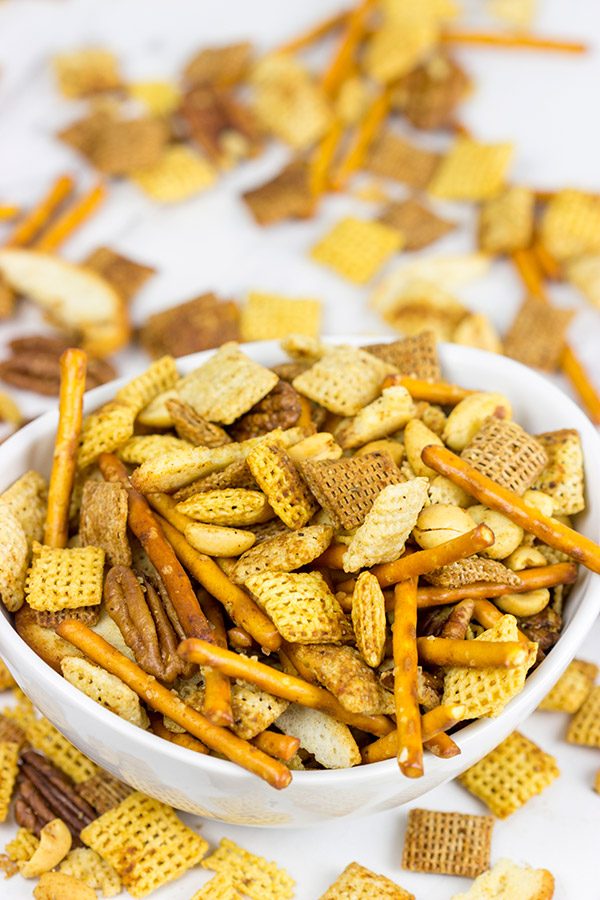 Craving a good snack for this weekend? This Slow Cooker Cajun Snack Mix is an easy and tasty treat!