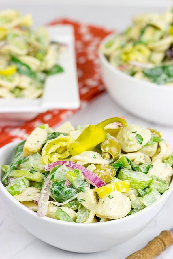This Smoked Mozzarella Pasta Salad has a secret ingredient: pepperoncini! This recipe is a delicious way to celebrate summer picnic season!