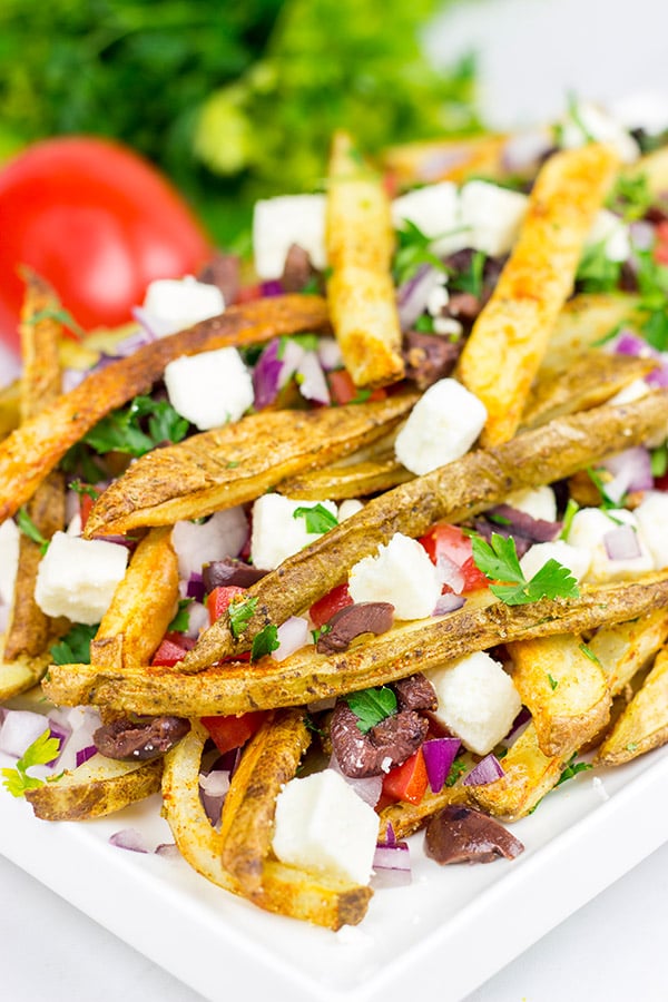 Loaded with feta, tomatoes and olives, these Baked Greek Fries make for one delicious appetizer!