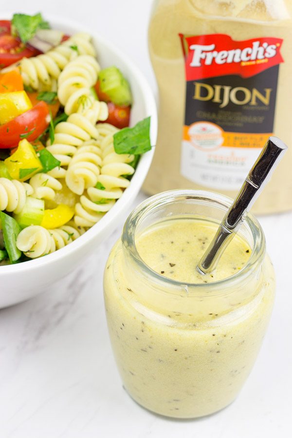 This Confetti Pasta Salad with Lemon Dijon Dressing is the perfect side dish for summer entertaining!