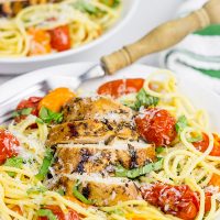 Pull out the grill! This Grilled Balsamic Chicken with Burst Tomatoes is one tasty summer recipe!