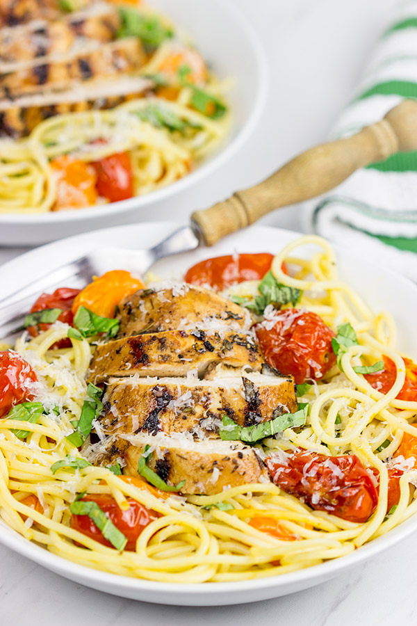 Pull out the grill! This Grilled Balsamic Chicken with Burst Tomatoes is one tasty summer recipe!