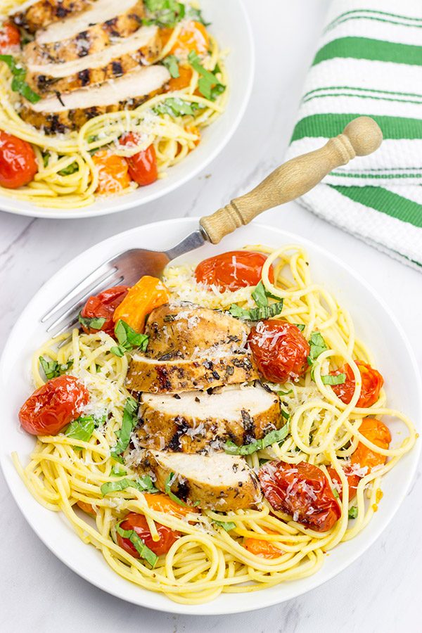 Pull out the grill! This Grilled Balsamic Chicken with Burst Tomatoes is one tasty summer recipe!