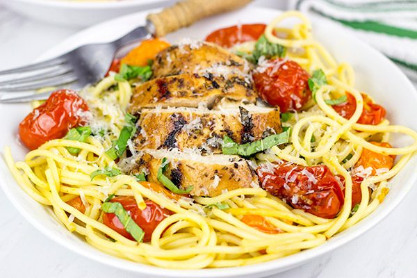 Pull out the grill! This Grilled Balsamic Chicken with Burst Tomatoes is one tasty summer recipe!