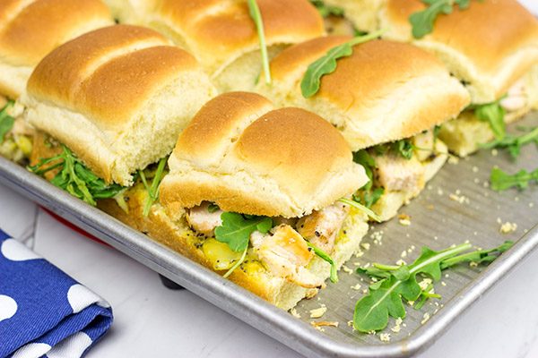 Looking for an easy and tasty summer picnic recipe? These Grilled Chicken Sliders with Poppyseed Butter are a favorite!