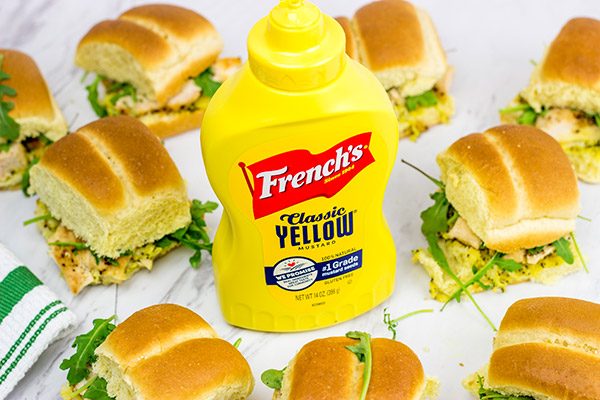Looking for an easy and tasty summer picnic recipe? These Grilled Chicken Sliders with Poppyseed Butter are a favorite!