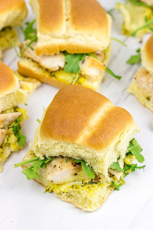 Looking for an easy and tasty summer picnic recipe? These Grilled Chicken Sliders with Poppyseed Butter are a favorite!