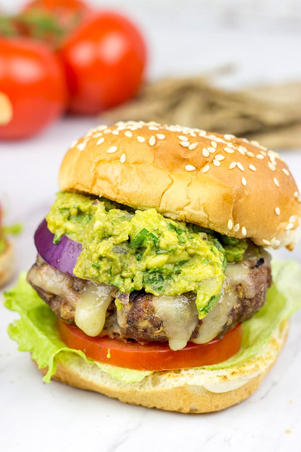 Have you ever tried guacamole on a burger? It's delicious! These Grilled Guacamole Burgers are a summer backyard favorite!