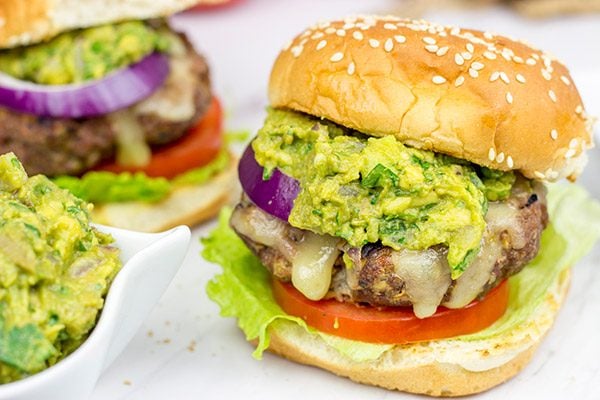 Have you ever tried guacamole on a burger? It's delicious! These Grilled Guacamole Burgers are a summer backyard favorite!