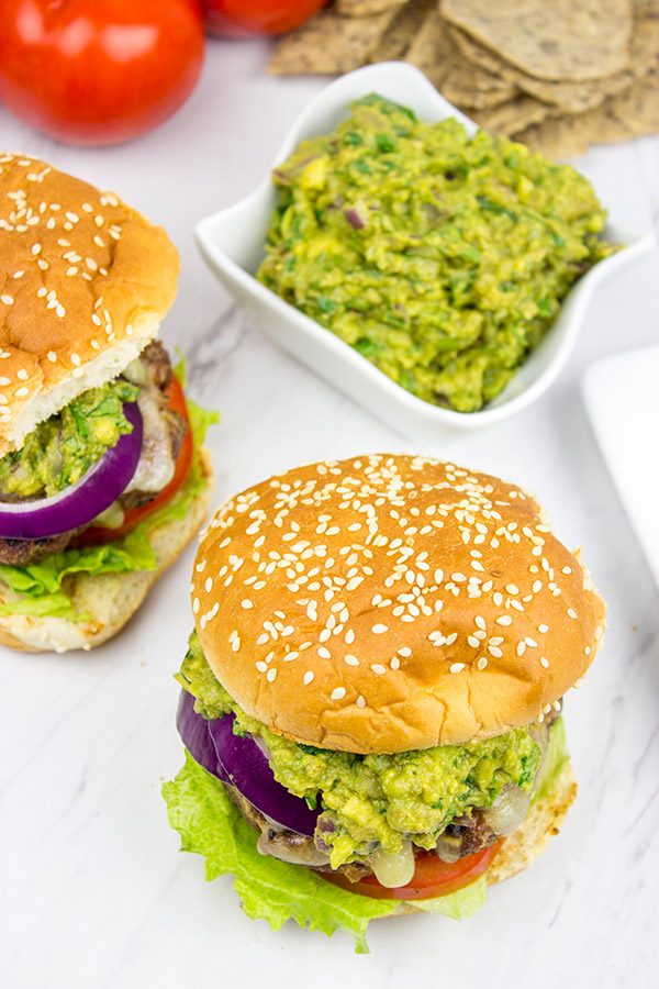Have you ever tried guacamole on a burger? It's delicious! These Grilled Guacamole Burgers are a summer backyard favorite!