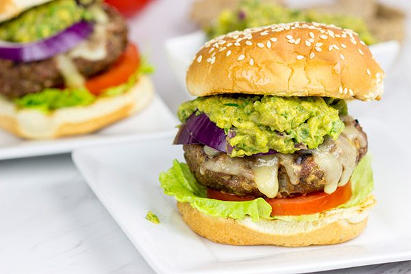 Have you ever tried guacamole on a burger? It's delicious! These Grilled Guacamole Burgers are a summer backyard favorite!