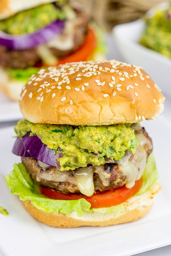 Have you ever tried guacamole on a burger? It's delicious! These Grilled Guacamole Burgers are a summer backyard favorite!