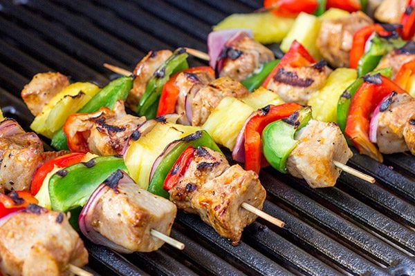 These Grilled Pork Kabobs are served over pasta for a fun and tasty summer meal!