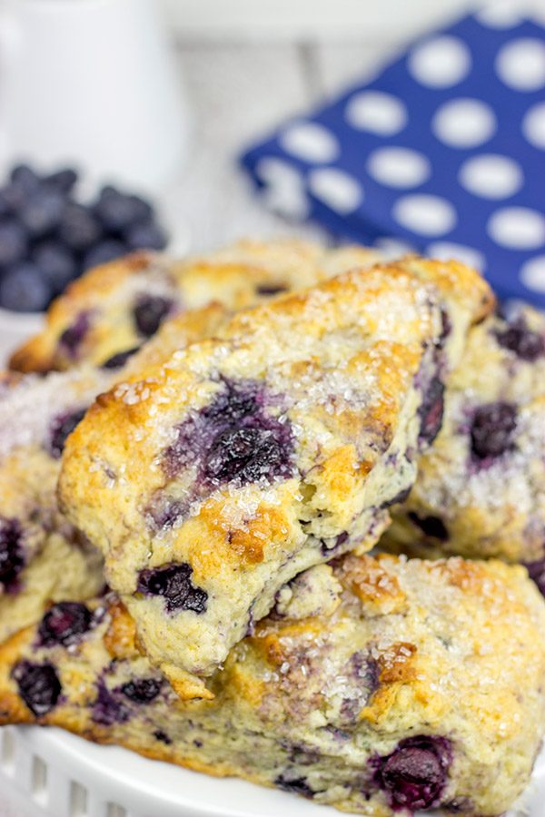 These Classic Blueberry Scones are a cross between a flavorful blueberry muffin and a crumbly buttermilk biscuit. I dare you to eat just one!
