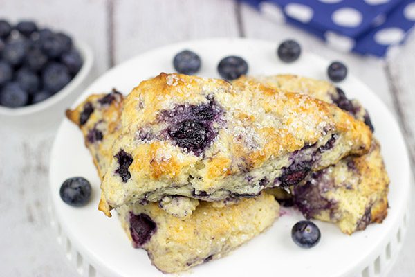These Classic Blueberry Scones are a cross between a flavorful blueberry muffin and a crumbly buttermilk biscuit. I dare you to eat just one!