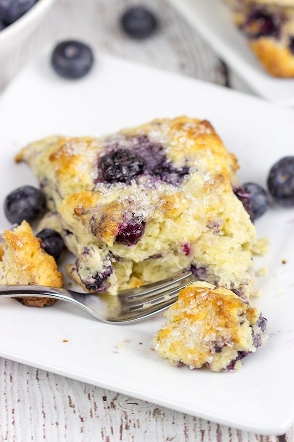 These Classic Blueberry Scones are a cross between a flavorful blueberry muffin and a crumbly buttermilk biscuit. I dare you to eat just one!