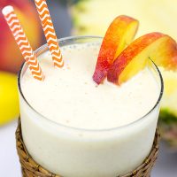 This Pineapple Peach Oatmeal Smoothie includes toasted oats for an extra layer of flavor. It's perfect for warm summer days!