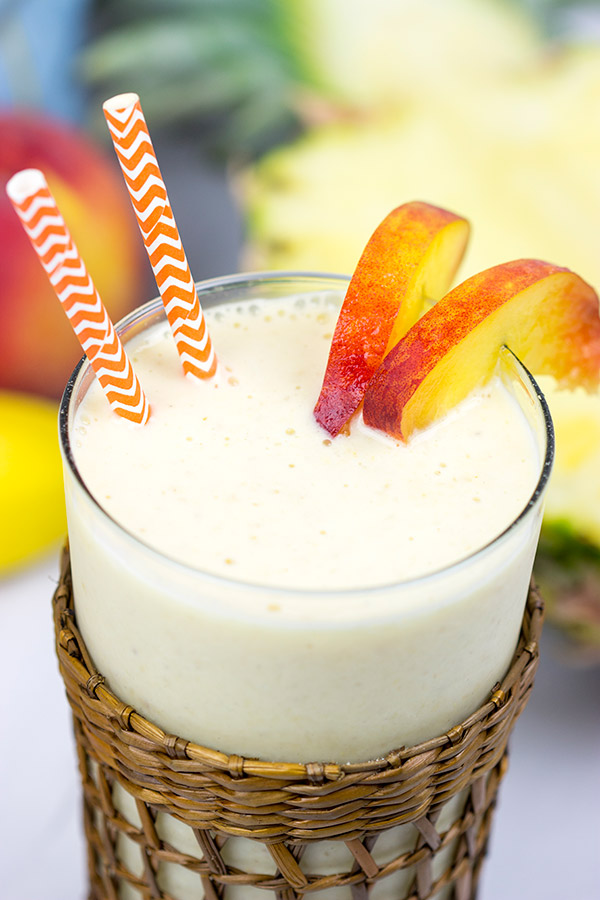 This Pineapple Peach Oatmeal Smoothie includes toasted oats for an extra layer of flavor. It's perfect for warm summer days!