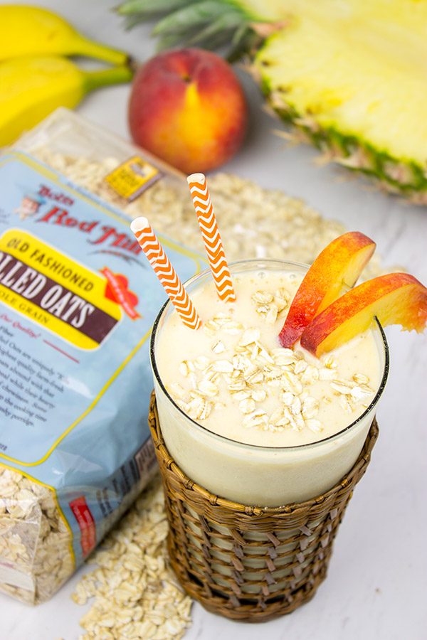 This Pineapple Peach Oatmeal Smoothie includes toasted oats for an extra layer of flavor. It's perfect for warm summer days!