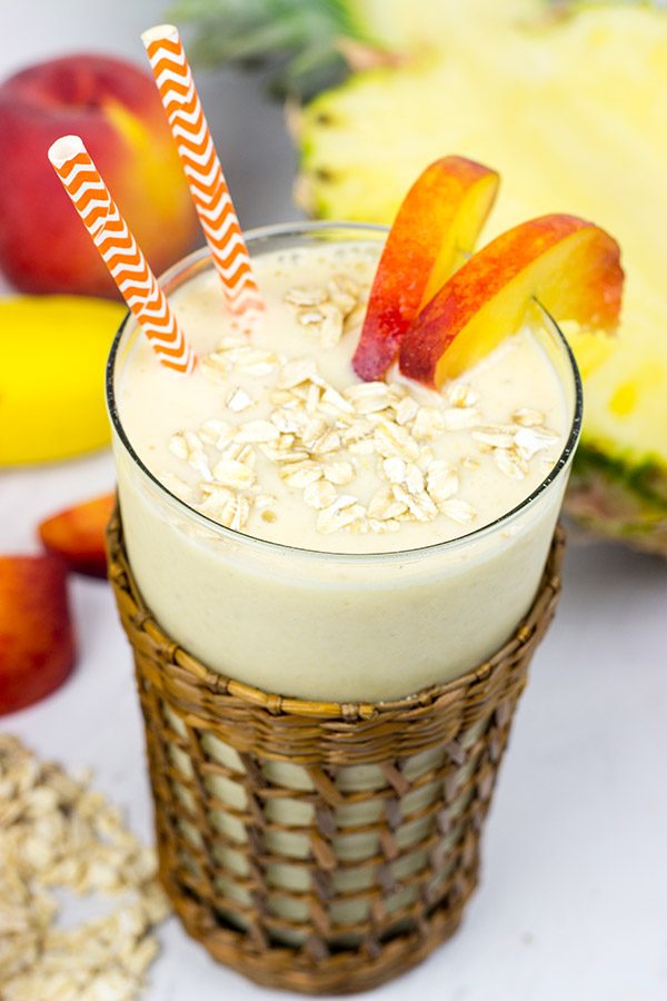 This Pineapple Peach Oatmeal Smoothie includes toasted oats for an extra layer of flavor. It's perfect for warm summer days!
