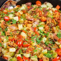 Pull out that cast iron skillet and whip up a batch of these Skillet Potatoes with Bacon and Cherry Tomatoes!