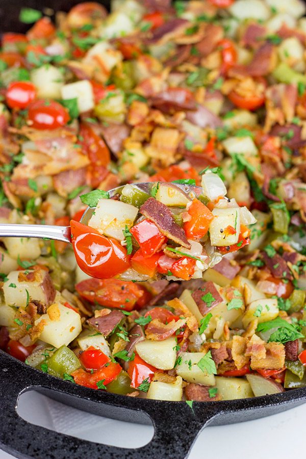 Pull out that cast iron skillet and whip up a batch of these Skillet Potatoes with Bacon and Cherry Tomatoes!