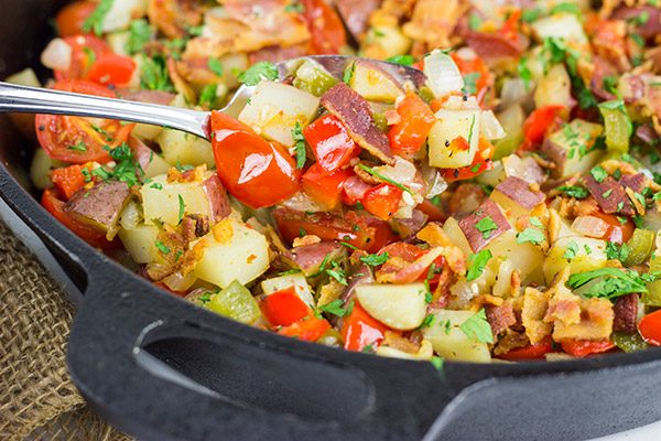 Pull out that cast iron skillet and whip up a batch of these Skillet Potatoes with Bacon and Cherry Tomatoes!
