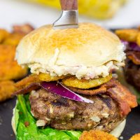This Southern Burger features both pimento cheese and fried pickles, and it's one delicious way to celebrate summer!