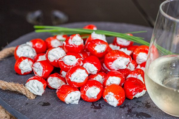 These Goat Cheese and Chive Stuffed Piquante Peppers are loaded with flavor, and they're a great summer appetizer!