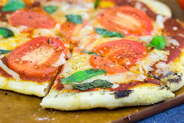 It's summer! Fire up the grill and make this Grilled Tomato Basil Pizza for dinner this weekend!