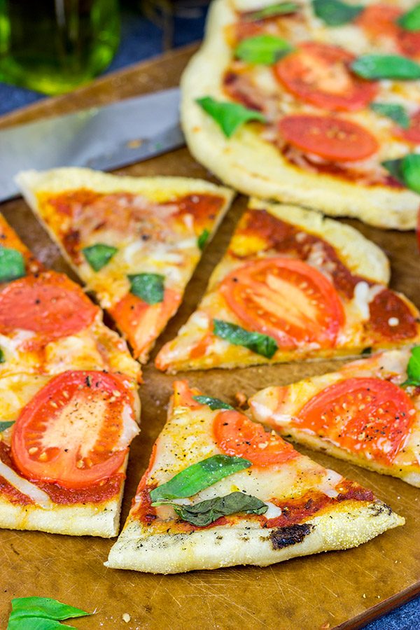 It's summer! Fire up the grill and make this Grilled Tomato Basil Pizza for dinner this weekend!