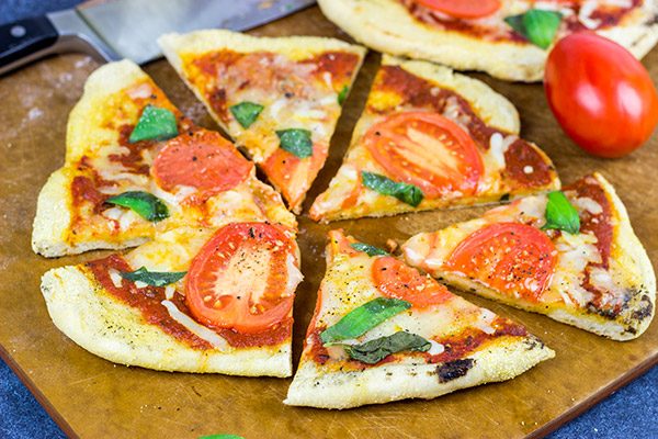 It's summer! Fire up the grill and make this Grilled Tomato Basil Pizza for dinner this weekend!