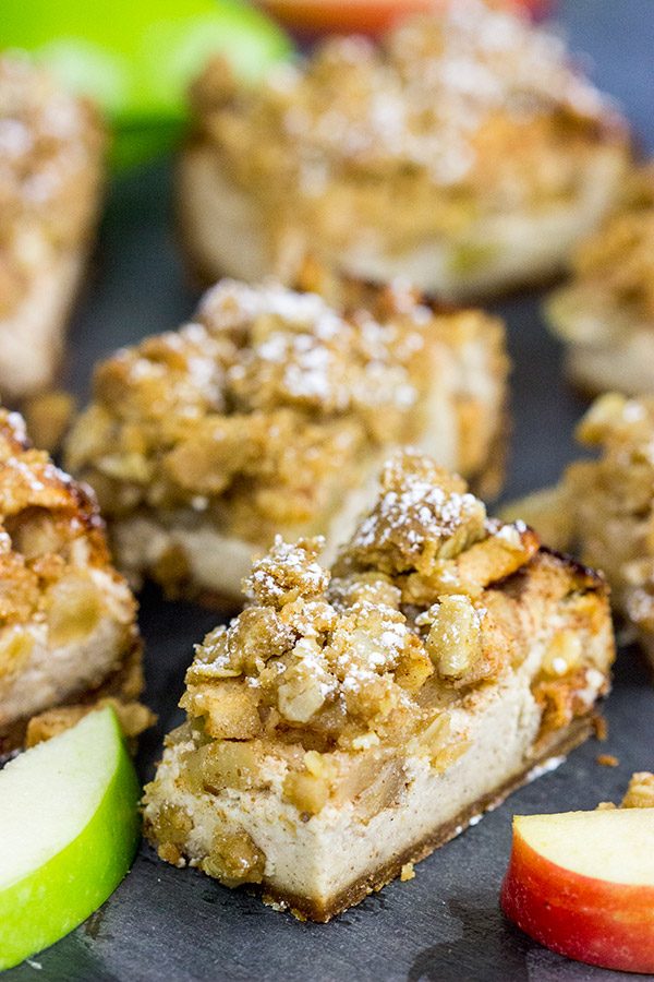 Apple cobbler or cheesecake for dessert?  Why not both!  These Apple Cobbler Cheesecake Bars are a tasty way to end a chilly Autumn day!