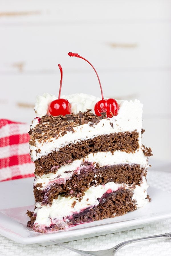 Featuring layers of chocolate cake filled with cherries and fresh whipped cream, the Black Forest Cake is a classic (and delicious!) dessert!