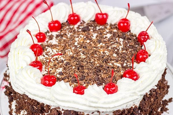 Featuring layers of chocolate cake filled with cherries and fresh whipped cream, the Black Forest Cake is a classic (and delicious!) dessert!