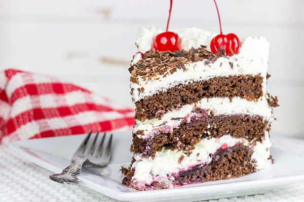 Featuring layers of chocolate cake filled with cherries and fresh whipped cream, the Black Forest Cake is a classic (and delicious!) dessert!
