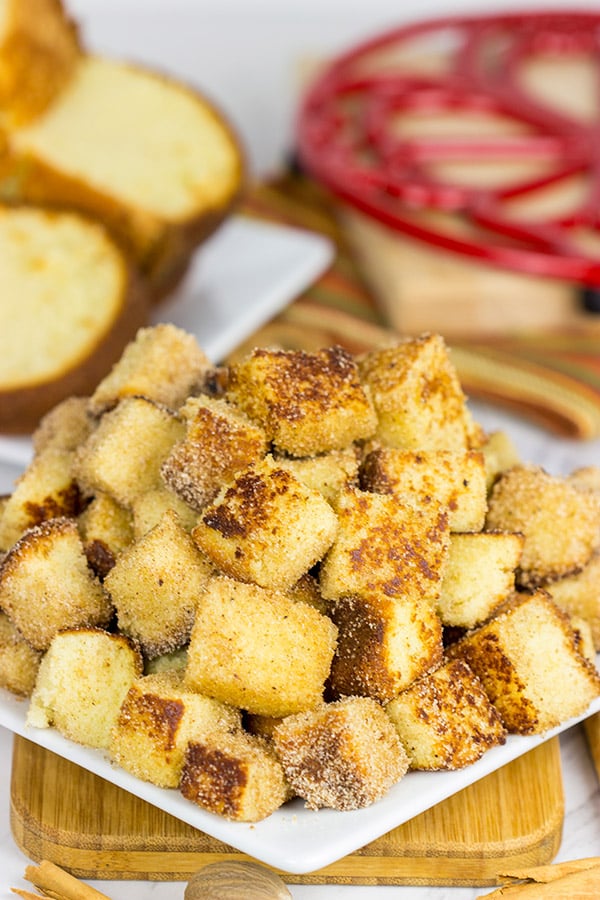 Take one fashioned pound cake.  Cut it into bites and then toss it in classic Autumn spices.  Oh yeah, these Pumpkin Spice Pound Cake Bites are quite tasty!