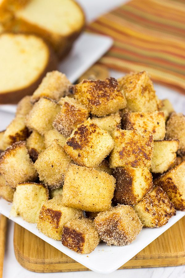 Take one fashioned pound cake.  Cut it into bites and then toss it in classic Autumn spices.  Oh yeah, these Pumpkin Spice Pound Cake Bites are quite tasty!
