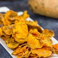 Looking for a fun snack idea? These Spicy Baked Sweet Potato Chips are sure to be a hit!