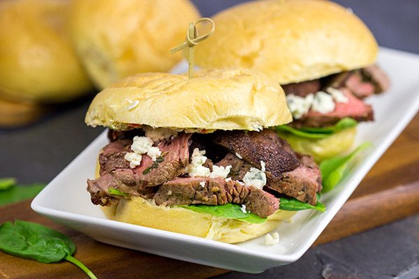 These Steak Sliders with Blue Cheese Butter and Grilled Mushrooms absolutely deserve a spot on your summer grilling menu!