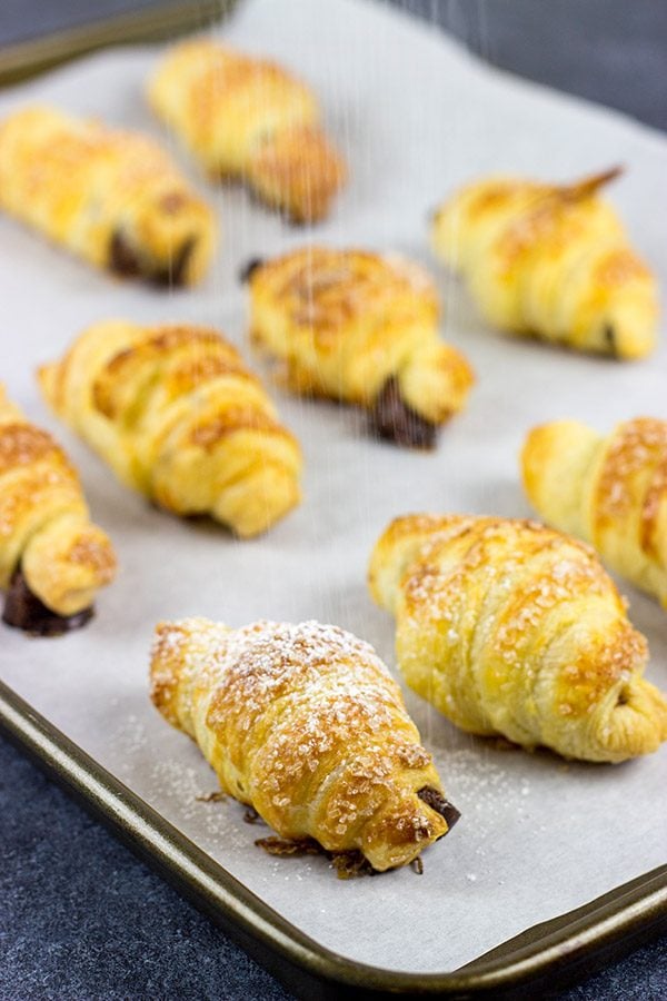 These Easy Pain au Chocolat (Chocolate-filled Croissants) are the perfect holiday treat for breakfast, dessert...or both!