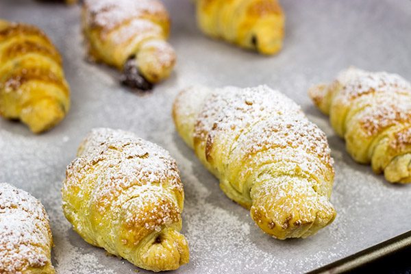 These Easy Pain au Chocolat (Chocolate-filled Croissants) are the perfect holiday treat for breakfast, dessert...or both!