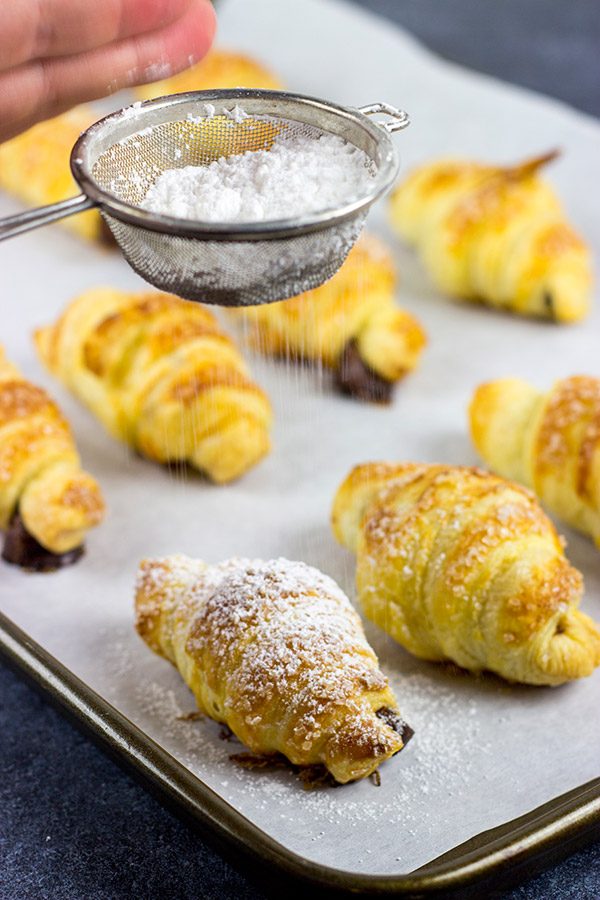 These Easy Pain au Chocolat (Chocolate-filled Croissants) are the perfect holiday treat for breakfast, dessert...or both!