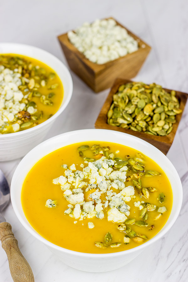 This Butternut Squash and Pumpkin Soup is a tasty (and healthy) way to warm up on chilly Autumn evenings!